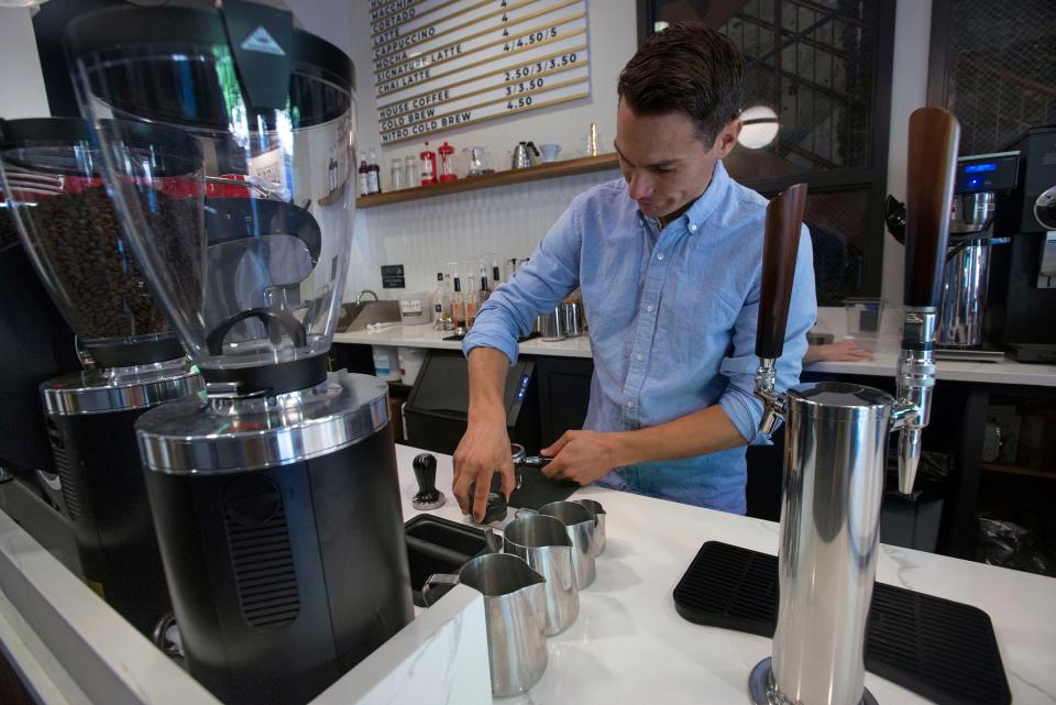 Lois Renaud assumes the duties of a barista at The Rex Cafe, Pensacola's newest coffee shop in downtown Pensacola on Thursday, May 12, 2022.