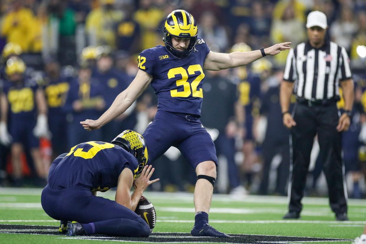 Michigan place kicker James Turner attempts a field goal against Washington during the first half of the national championship game at NRG Stadium in Houston, Texas on Monday, Jan. 8, 2024.