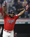 Cleveland Indians' Yasiel Puig celebrates after hitting a game-winning RBI-single in the 10th inning in a baseball game against the Detroit Tigers, Wednesday, Sept. 18, 2019, in Cleveland. The Indians won 2-1. (AP Photo/Tony Dejak)