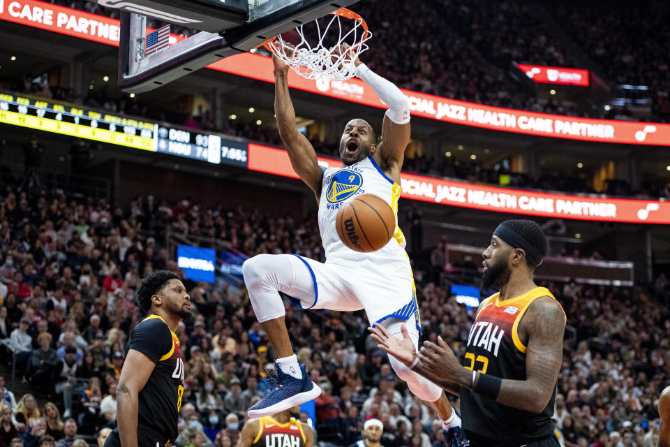 FILE - Golden State Warriors forward Andre Iguodala (9) dunks in the first half during an NBA basketball game against the Utah Jazz Saturday, Jan. 1, 2022, in Salt Lake City. Iguodala, a four-time champion with the Golden State Warriors during a 19-year NBA career, is retiring. “It’s just the right time,” the 39-year-old Iguodala told Andscape in a telephone interview Friday, Oct. 20, 2023. (AP Photo/Isaac Hale, File)