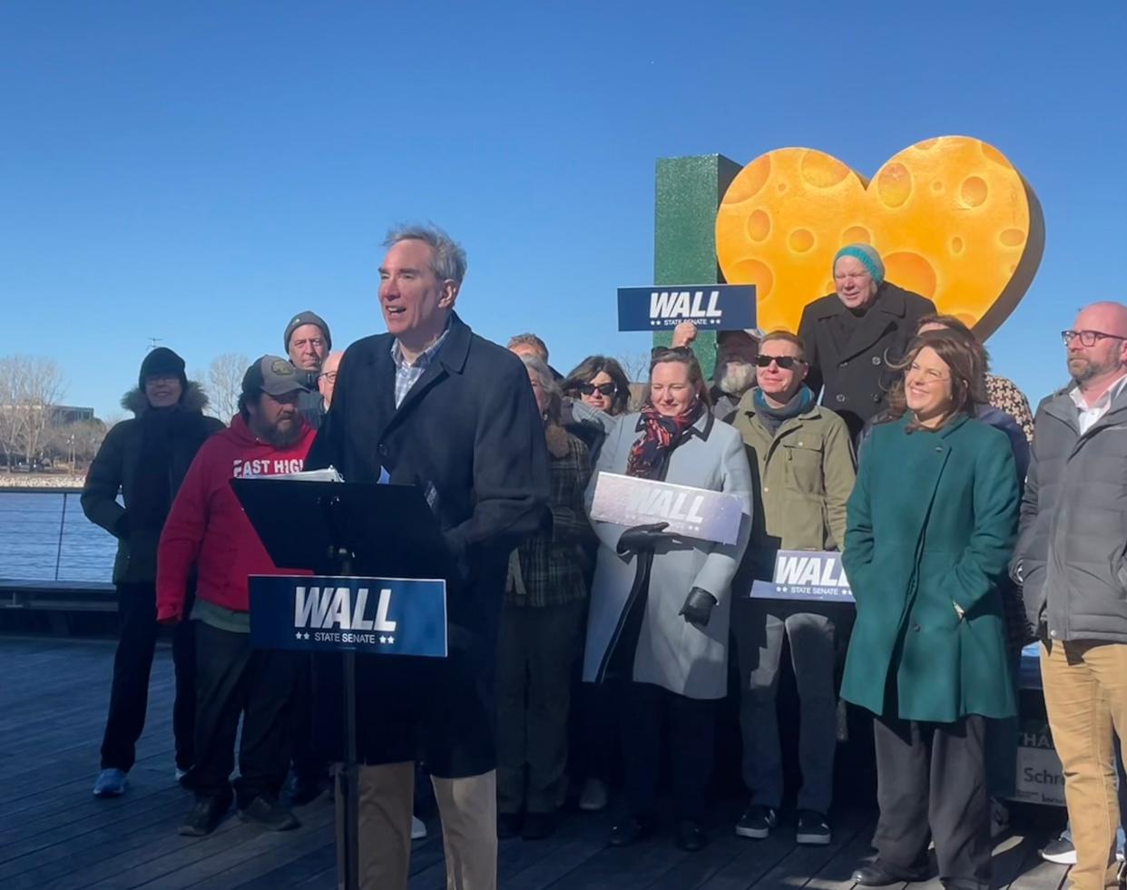 Business consultant Jamie Wall announces a Democratic run for Wisconsin's Senate District 30 on Wednesday on the CityDeck in Green Bay.