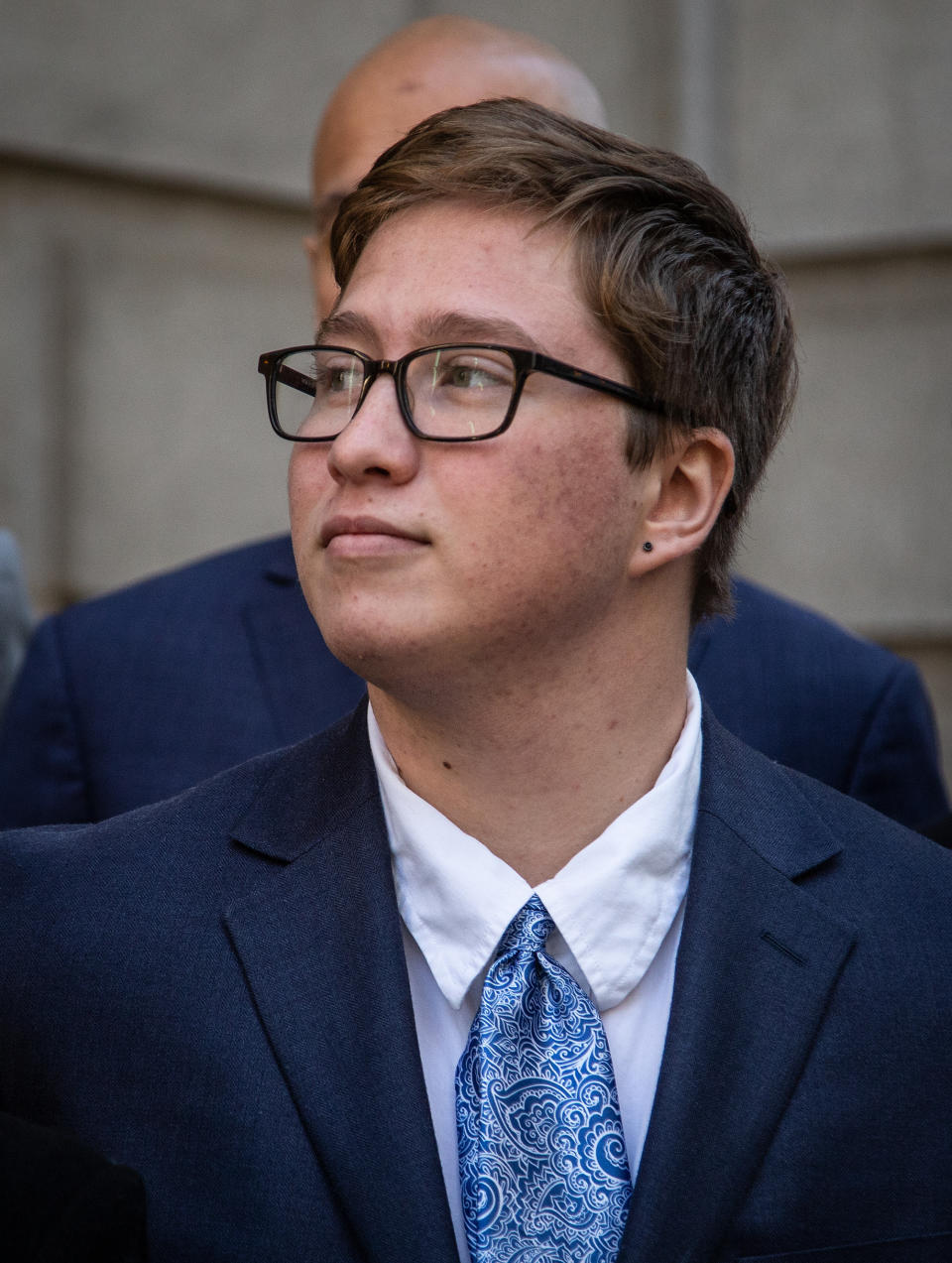 Transgender student Drew Adams stands outside of the 11th Circuit Court of Appeals on Thursday, Dec. 5, 2019, in Atlanta. A federal appeals court said Monday, Aug. 10, 2020, that a Florida school district was wrong when it forced a transgender student to either use a girls or gender neutral bathroom even though he identified as a boy. (AP Photo/ Ron Harris)