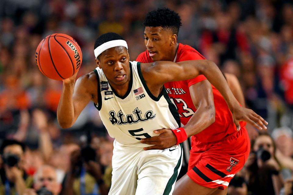 Apr 6, 2019; Minneapolis, MN, USA; Michigan State Spartans guard Cassius Winston (5) brings the ball up court against Texas Tech Red Raiders guard Jarrett Culver (23) during the second half in the semifinals of the 2019 men's Final Four at US Bank Stadium.