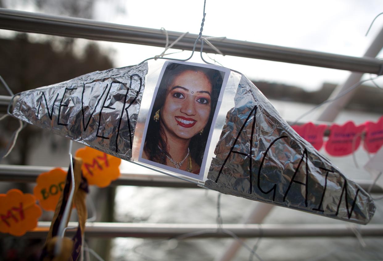A hanger featuring a picture of Savita Halappanavar. (Photo: Andrew Cowie/Getty Images)