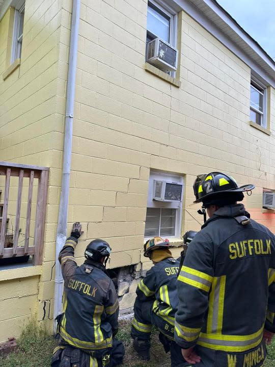 Car strikes building on Wellons St. (Courtesy: Suffolk Department of Fire and Rescue)