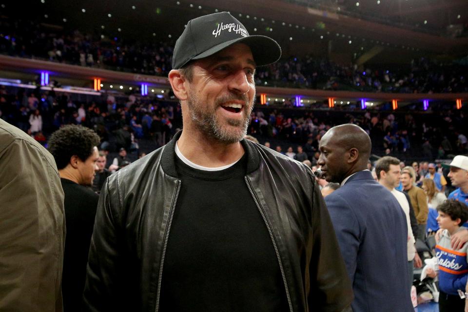 New York Jets quarterback Aaron Rodgers attended Game 1 of the NBA Eastern Conference semifinal playoff series between the New York Knicks and the Miami Heat on Sunday at Madison Square Garden.