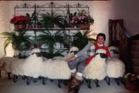 <p>Fashion designer Valentino poses on fake sheep while vacationing at a ski resort in Switzerland in 1977. </p>