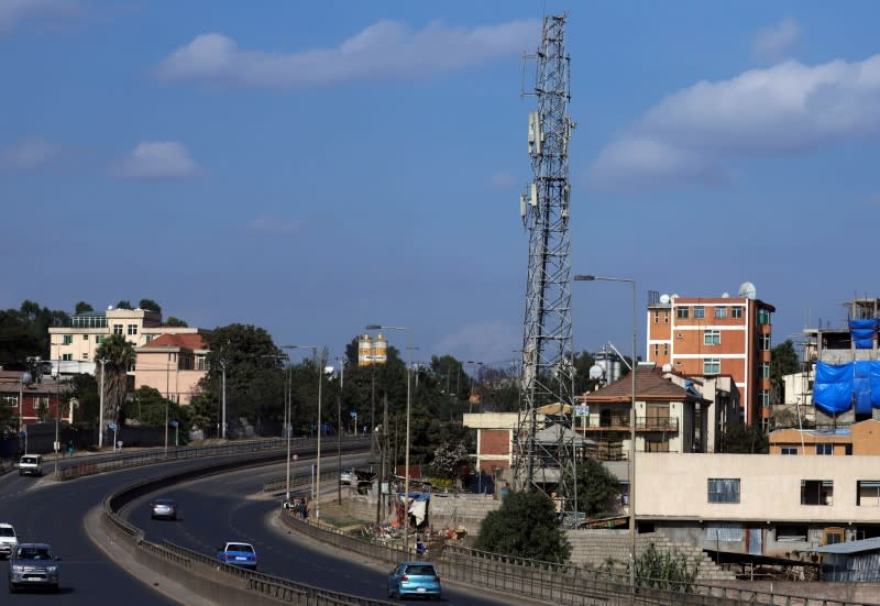 FILE PHOTO: Motorists drive past an Ethio-Telecom network tower in Addis Ababa