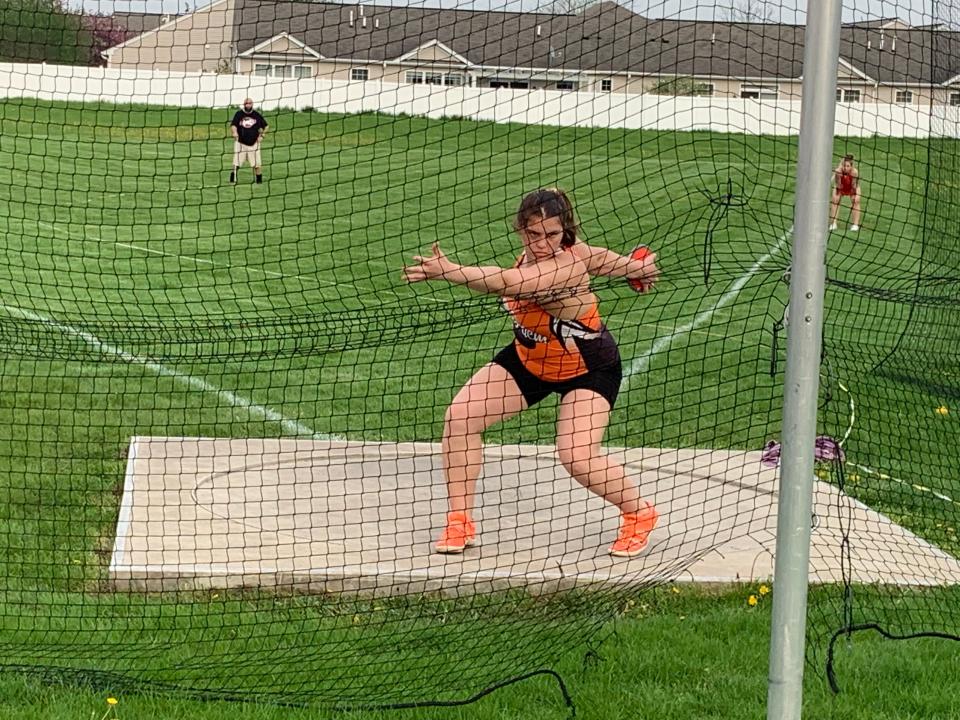 Harlem's Emma Rich, pictured about to make one of her throws in the sectional finals on Wednesday, May 11, 2022, in Huntley, advanced by winning the event with her best throw of the season.
