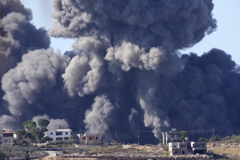 FILE - Black smoke rises from an Israeli airstrike on the outskirts of Aita al-Shaab, a Lebanese border village with Israel in south Lebanon, Saturday, Nov. 4, 2023. The prospect of a full-scale war between Israel and Lebanon's Hezbollah militia terrifies people on both sides of the border, but some see it as an inevitable fallout from Israel's ongoing war against Hamas in Gaza, particularly as cease-fire negotiations have faltered. (AP Photo/Hussein Malla, File)