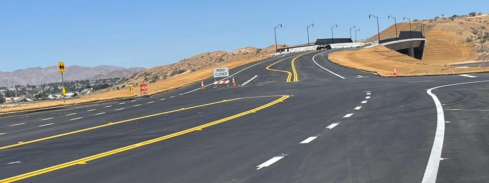 San Bernardino County's $9.5 billion budget benefits several High Desert projects and services, including the completed Green Tree Boulevard Extension and Bridge project.
