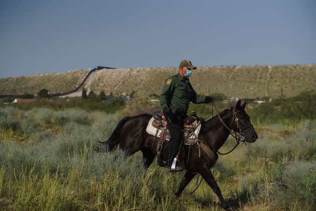 A US border patrol officer on horseback at the US-Mexico border in Sunland Park (Photo: PAUL RATJE via Getty Images)