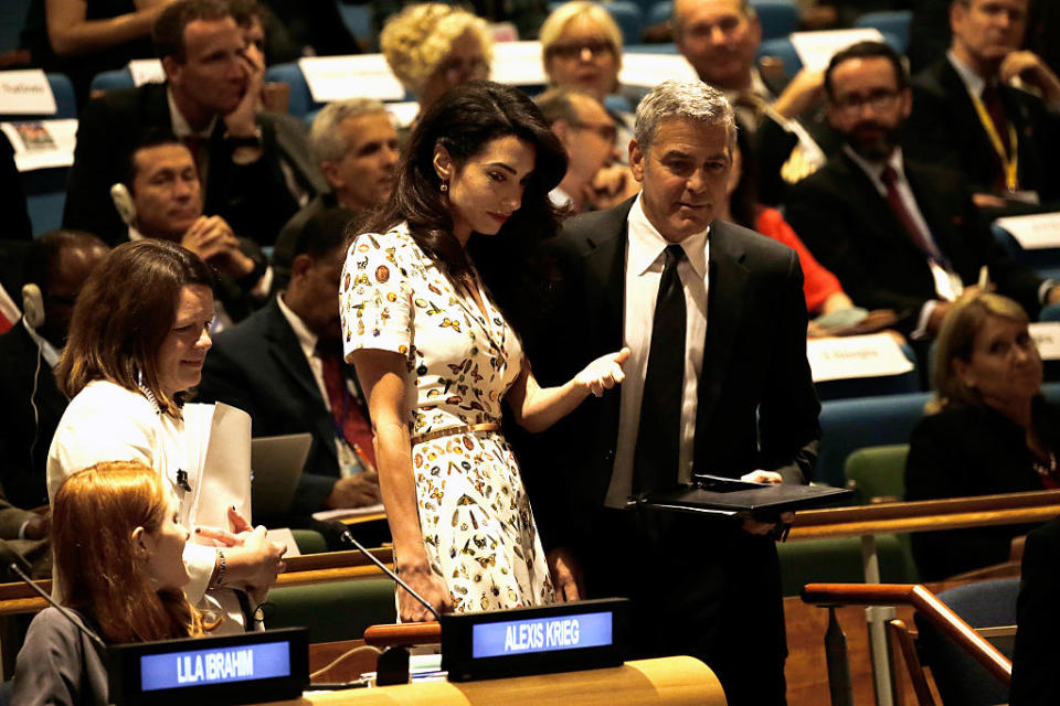 <p>A printed Alexander McQueen to the U.N. seems like a bold choice for the U.N., but the glamorous human rights lawyer totally makes it work. <i>(Photo by Peter Foley - Pool/Getty Images)</i></p>