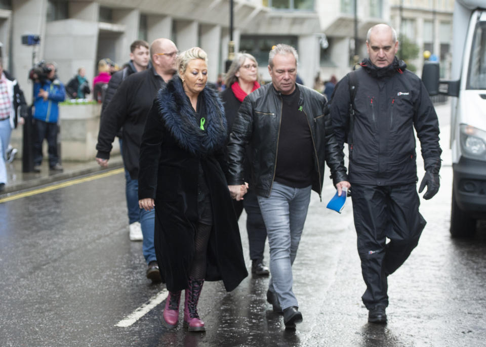 Harry Dunn mother Charlotte Charles (left) and stepfather Bruce Charles (centre) outside the Ministry Of Justice in London after meeting with the Director of Public Prosecutions. Anne Sacoolas has been charged with causing death by dangerous driving after the car she was driving allegedly collided with 19-year-old Harry's motorbike outside RAF Croughton in Northamptonshire on August 27.