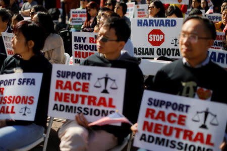 Supporters attend the "Rally for the American Dream - Equal Education Rights for All," ahead of the start of the trial in a lawsuit accusing Harvard University of discriminating against Asian-American applicants, in Boston, October 14, 2018. REUTERS/Brian Snyder