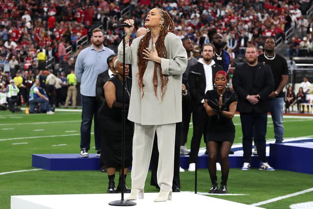 <p>Kevin Mazur/Getty</p> Andra Day performs during the Super Bowl LVIII Pregame at Allegiant Stadium on February 11, 2024 in Las Vegas, Nevada.