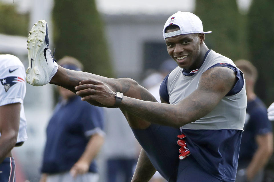 New England Patriots wide receiver Josh Gordon warms up at NFL football practice, Monday, Aug. 19, 2019, in Foxborough, Mass. (AP Photo/Elise Amendola)