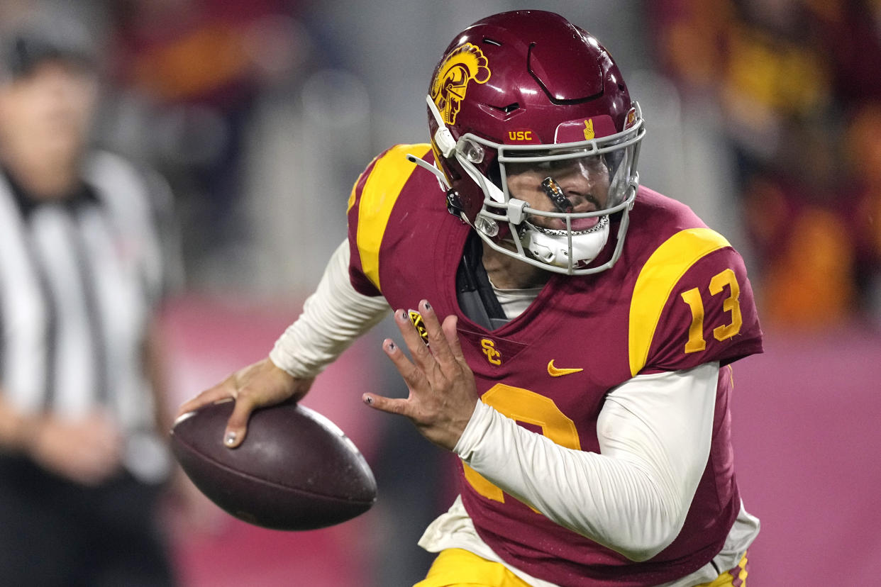 USC quarterback Caleb Williams threw for 232 yards and a touchdown while also running for three scores against Notre Dame on Nov. 26, 2022, in Los Angeles. (AP Photo/Mark J. Terrill)