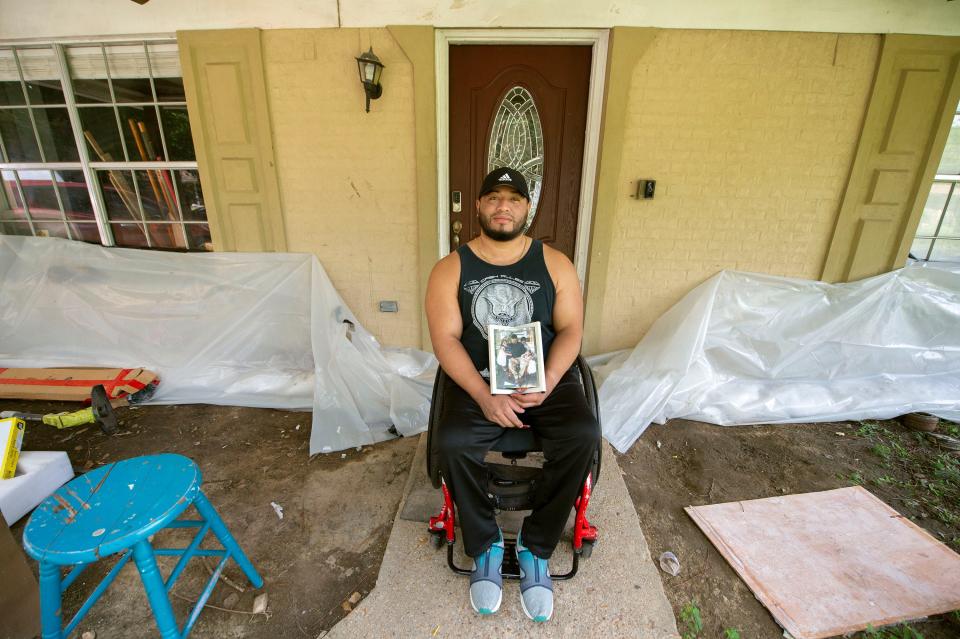 Nelson Fiallos has lived in his northeast Jackson, Miss., home since 2009 and has fought habitual flooding. Sandbags saved them this time, Fiallos explained Friday, Sept. 1, 2022. Now, with the city water crisis, he and his wife Elena decided to send their three children, 3, 5, and 7 years old, to Honduras to live with their grandmother for a year to keep them safe and away from the water.