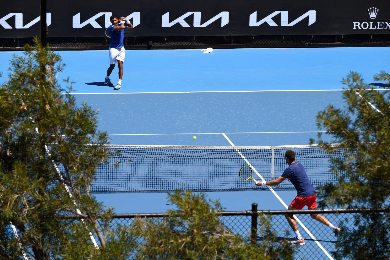 Tennis players at a practice session ahead of the Australian Open.