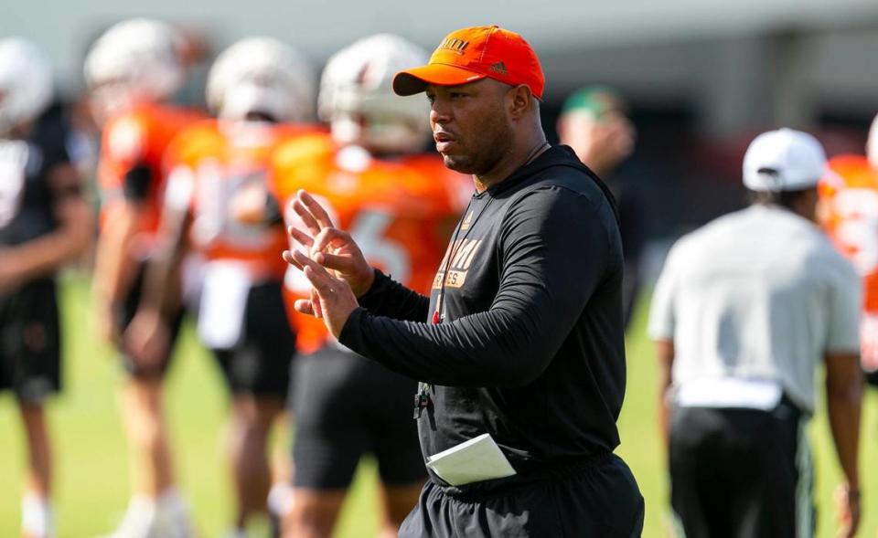Miami Hurricanes offensive coordinator Josh Gattis runs drills with his team at the University of Miami’s Greentree Practice Fields on Monday, Aug. 8, 2022, in Coral Gables, Fla.