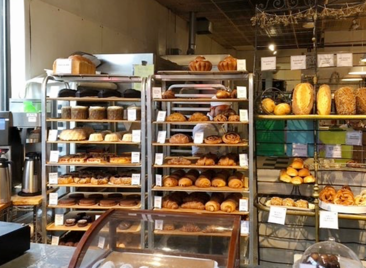 baked goods on racks at clear flour bread bakery.