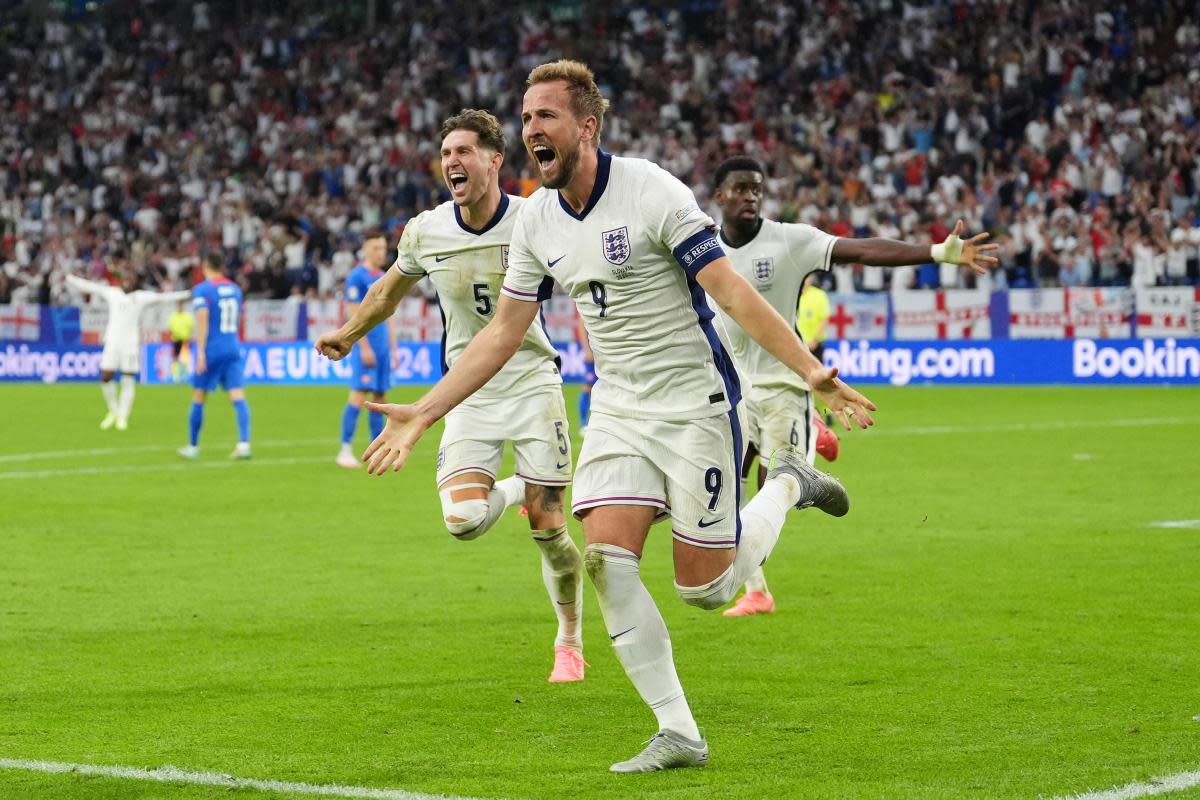 Harry Kane and John Stones celebrate during England's 2-1 win over Slovakia on Sunday <i>(Image: PA)</i>