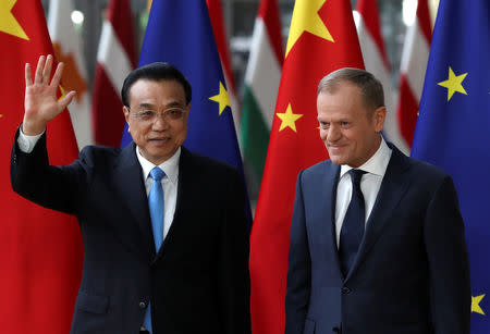 Chinese Premier Li Keqiang and European Council President Donald Tusk arrive ahead of a EU-China summit in Brussels, Belgium April 9, 2019. REUTERS/Yves Herman