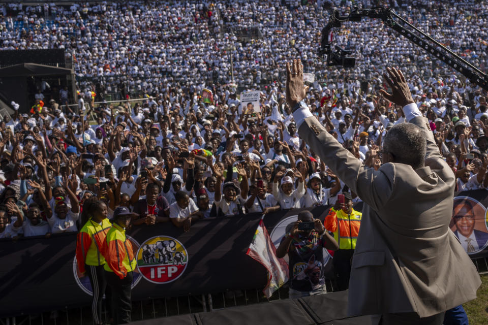 The leader of Inkatha Freedom Party, Velenkosi Hlabisa, waves to the crowd during an election rally in Richards Bay, near Durban, South Africa, Sunday, May 26, 2024, in anticipation of the 2024 general elections scheduled for May 29. (AP Photo/Emilio Morenatti)