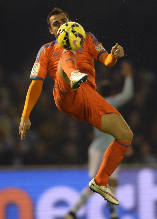 Valencia's forward Paco Alcacer, seen in action during a Spanish La Liga match at the Balaidos stadium in Vigo, on January 10, 2015