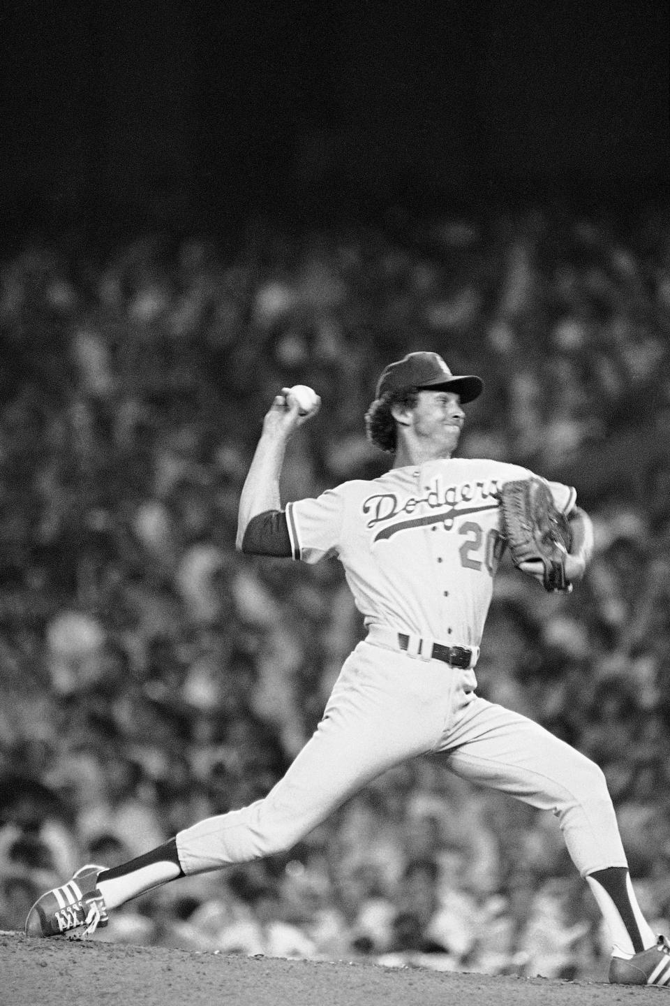 File-This July 20, 1977, file photo shows American League pitcher Don Sutton of the Los Angeles Dodgers in the 48th All-Star Game in New York Sutton, a Hall of Fame pitcher who was a stalwart of the Los Angeles Dodgers' rotation spanning an era from Sandy Koufax to Fernando Valenzuela, died Tuesday, Jan. 19, 2021. He was 75. The Baseball Hall of Fame in Cooperstown, New York, said Sutton died at his home in Rancho Mirage, California, after a long struggle with cancer. The Atlanta Braves, where Sutton was a long-time broadcaster, said he died in his sleep. (AP Photo, File) (AP Photo, File)