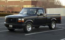 <p>As a direct response to Chevy's hot 454 SS, Ford launched the Lightning-a high-performance pickup tuned by the company's Special Vehicles Team (SVT). Instead of dropping in a larger and heavier motor into the truck, the SVT team modified Ford's 5.8-liter small block V-8 inside and out with high-performance parts to deliver 240 hp and a solid 340 lb-ft of torque. The suspension was lowered by 2.5 inches, and thanks to new shocks, springs, anti-roll bars, and huge 17-inch tires, the Lightning handled better than its Chevy rival. Just more than 11,000 of these first- generation Ford Lightnings were produced. The truck was so well received that Ford commissioned a second generation in 1999.</p>