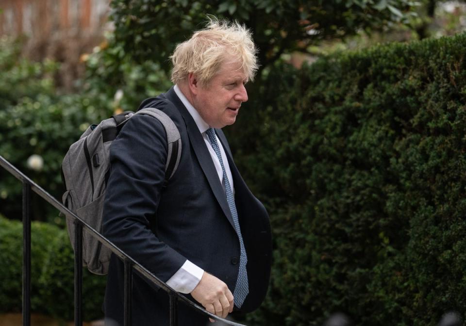 Former British prime minister Boris Johnson leaves his home (Getty Images)