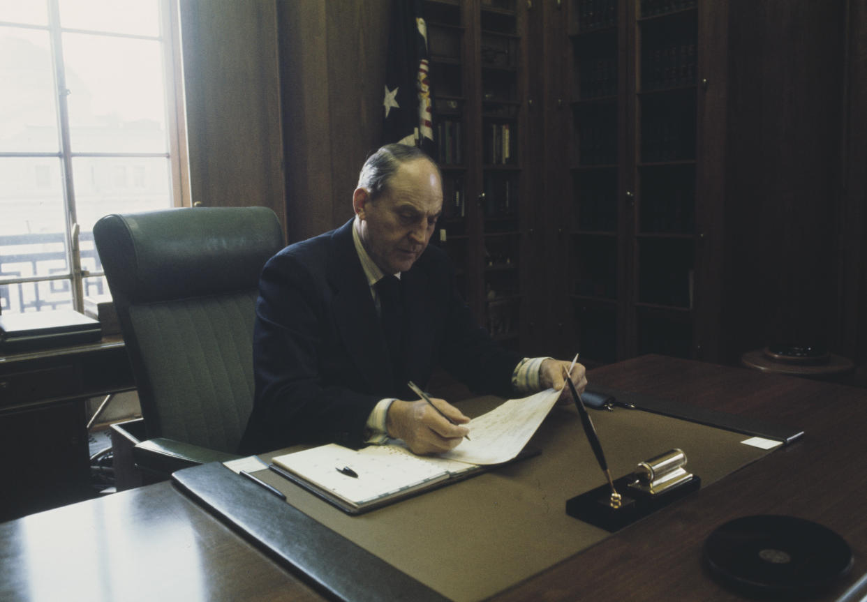 US Attorney General William Saxbe (1916 - 2010) seated in his office at the Justice Department in Washington on March 8th, 1974. (Photo by UPI/Bettmann Archive/Getty Images)