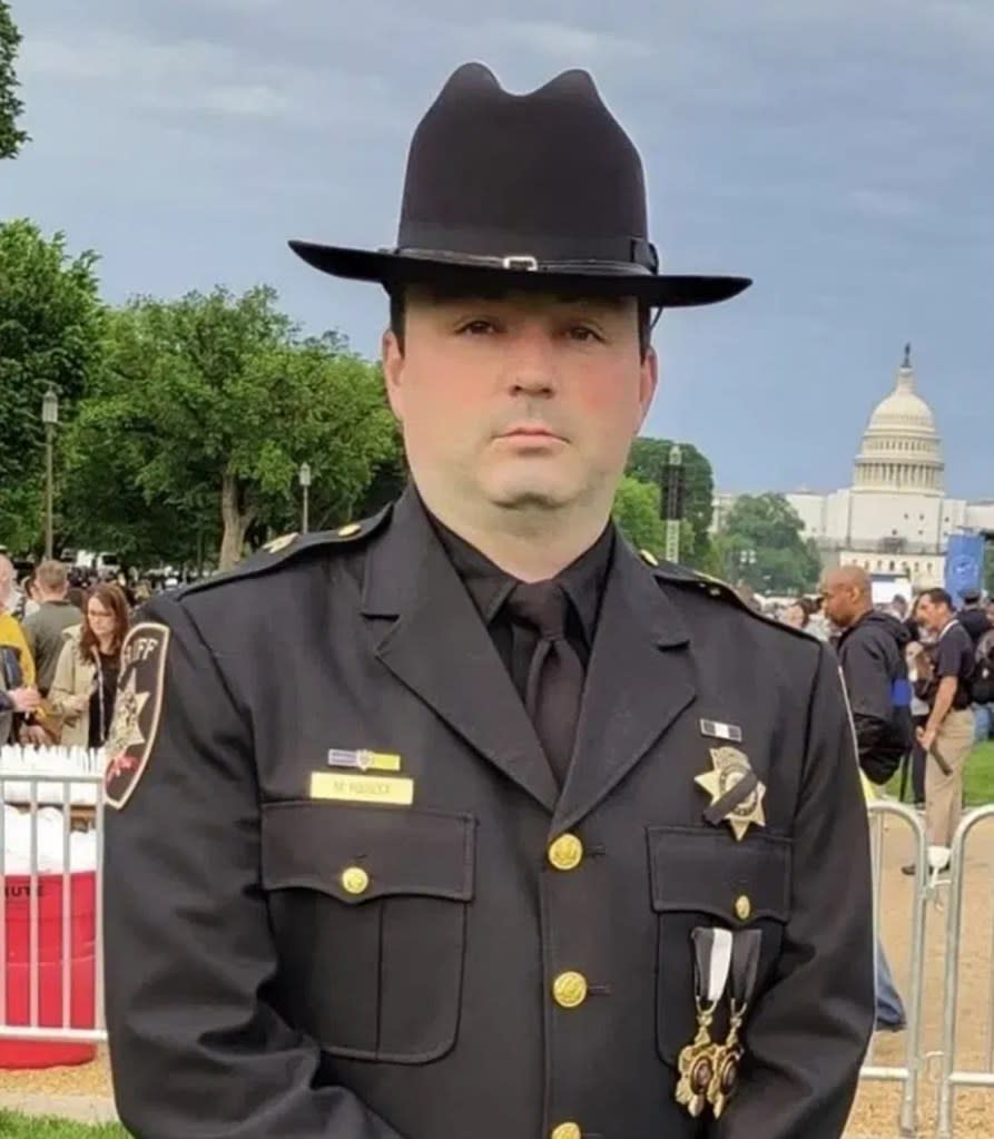 Michael Hoosock, who died on duty, was a a decorated Onondaga County Sheriff’s Deputy and married dad of three. Onondaga County Sheriff's Office
