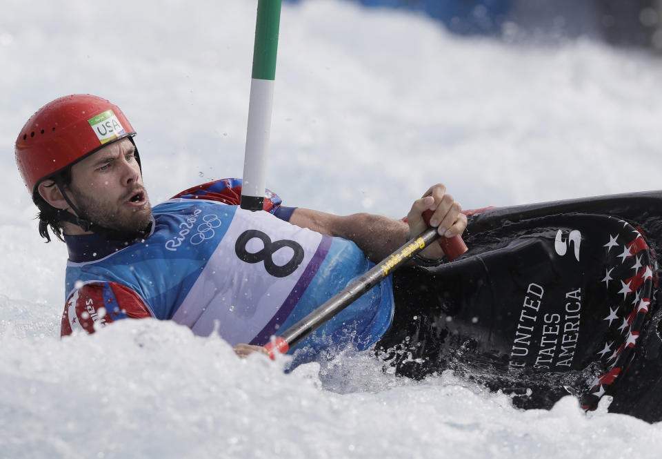 Casey Eichfeld of the United States competes during the canoe single C1 men's semifinal of the Canoe Slalom at the 2016 Summer Olympics in Rio de Janeiro, Brazil, Tuesday, Aug. 9, 2016. (AP Photo/Kirsty Wigglesworth)