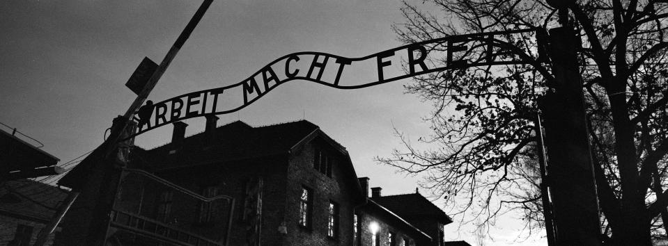 The main entrance at the former Nazi death camp of Auschwitz in Oswiecim, Poland, with the inscription, 'Arbeit Macht Frei', which translates into English as '"Work will set you Free", Sunday, Dec. 8, 2019. On Jan. 27, 1945, the Soviet Red Army liberated the Auschwitz death camp in German-occupied Poland. Auschwitz was the largest of the Germans' extermination and death camps and has become a symbol for the terror of the Holocaust. On Monday — 75 years after its liberation — hundreds of survivors from across the world will come back to visit Auschwitz for the official anniversary commemorations. In advance of that, Associated Press photographer Markus Schreiber visited the site. Using a panoramic camera with analog film, he documented the remains of the camp in a series of haunting black and white photos. (AP Photo/Markus Schreiber)