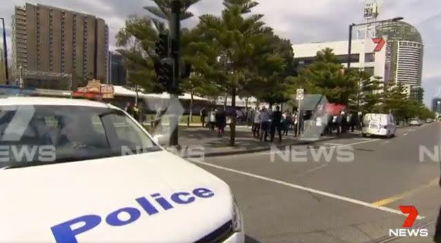 Part of Harbourside Esplanade was blocked off by police vehicles. Photo: 7 News