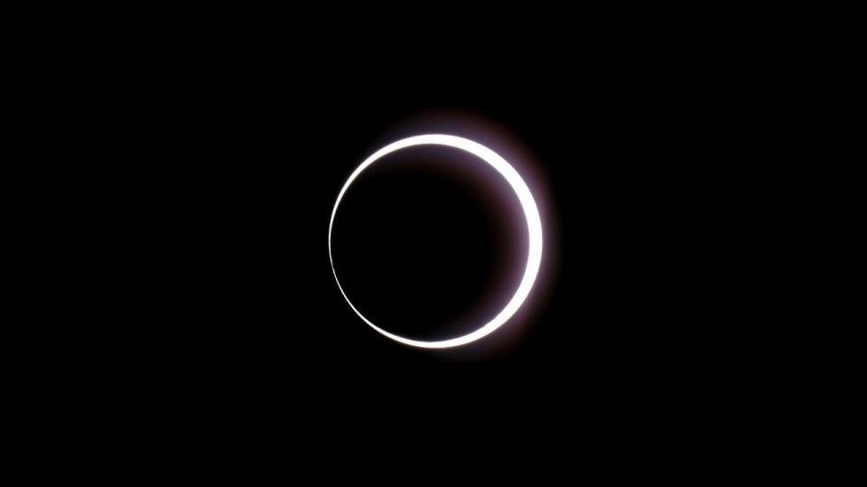 The moon passes between earth and the sun during a rare &quot;ring of fire&quot; eclipse of the sun Saturday, October 14, 2023, in Bryce Canyon National Park, Utah, US.