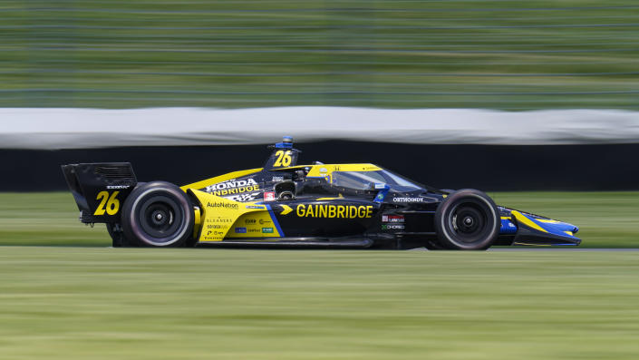 Colton Herta drives during practice for the IndyCar auto race at Indianapolis Motor Speedway in Indianapolis, Friday, May 14, 2021. (AP Photo/Michael Conroy)