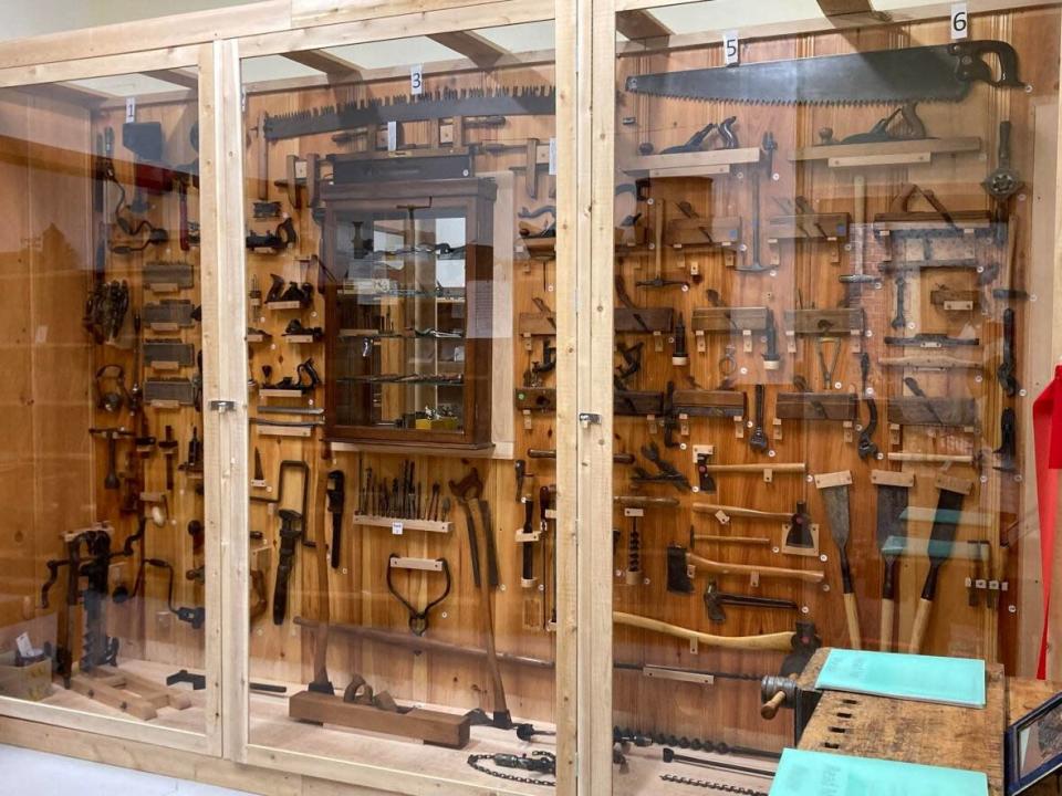 Clement Powell collected and restored tools his whole life. Following his death, his family donated the collection to the Agricultural Museum of New Brunswick — wall and all.  (Agricultural Museum of New Brunswick - image credit)