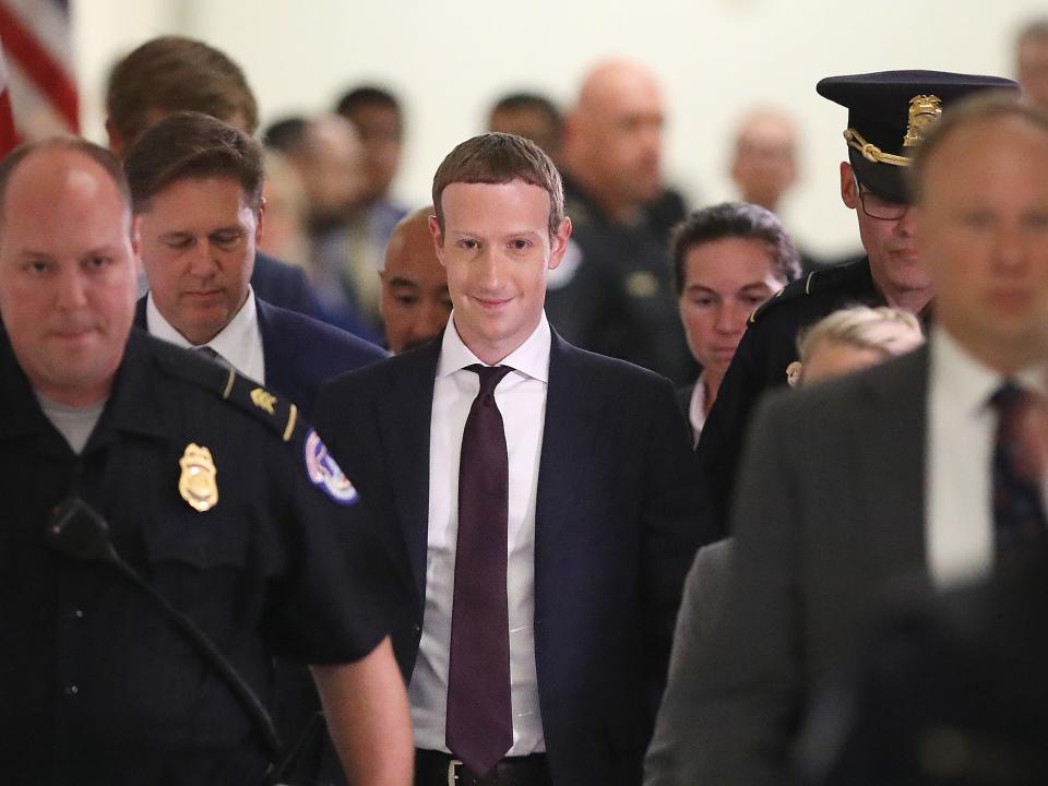 mark zuckerberg congress WASHINGTON, DC - OCTOBER 23: Facebook co-founder and CEO Mark Zuckerberg leaves the Rayburn House Office Building after testifying before the House Financial Services Committee for six hours on Capitol Hill October 23, 2019 in Washington, DC. Zuckerberg testified about Facebook's proposed cryptocurrency Libra, how his company will handle false and misleading information by political leaders during the 2020 campaign and how it handles its users’ data and privacy. (Photo by Chip Somodevilla/Getty Images)