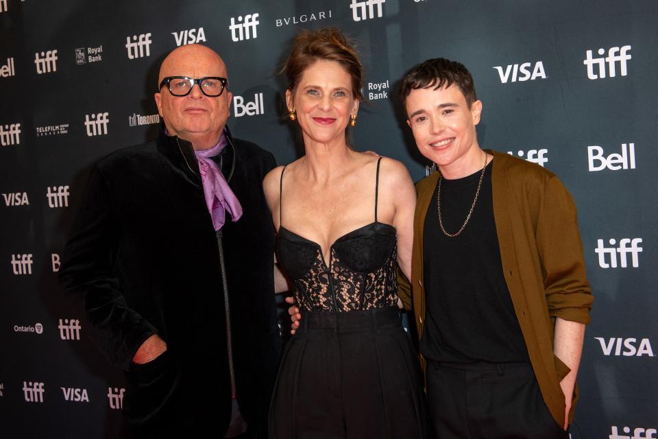 (L-R) Director Dominic Savage, actors Hillary Baack and Elliot Page arrive at the premiere of 