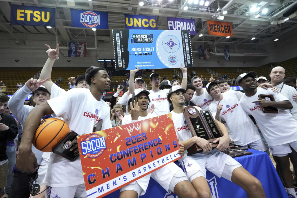 Forman celebrates after their win over Chattanooga in the NCAA men's college basketball championship game for the Southern Conference tournament, Monday, March 6, 2023, in Asheville, N.C. (AP Photo/Kathy Kmonicek)