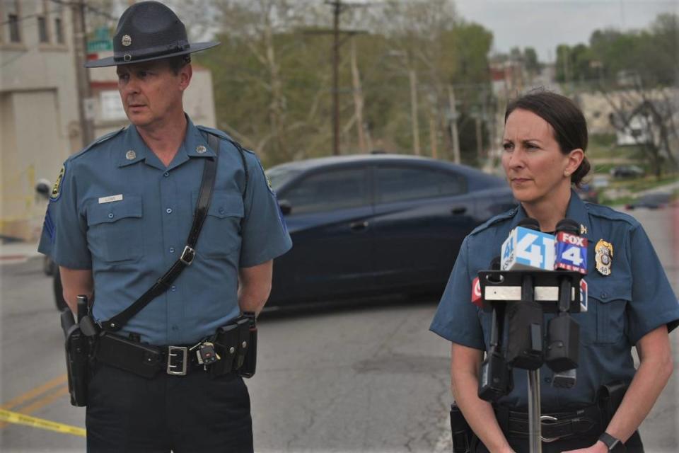 Kansas City Police Chief Stacey Graves, right, and Missouri State Highway Patrol Sgt. Bill Lowe prepare to brief news reporters near 27th Street and Lister Avenue after officers fatally shot a man who was allegedly armed with a handgun.