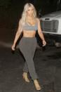 <p>In a heather gray sports bra, dark gray sweat pants, and nude sock boots while out in LA.</p>