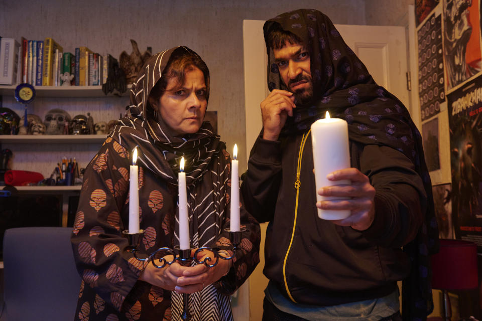 Abdulla's mum Bushra (Nina Wadia) and cousin Shafi (Sia Alipour) attempt an exorcism.