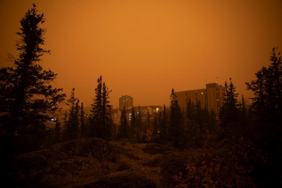 Heavy smoke from wildfires in northern Alberta and British Columbia fill the air at 9am Mountain Daylight Time in Yellowknife, Northwest Territories on Saturday, Sept. 23, 2023. 