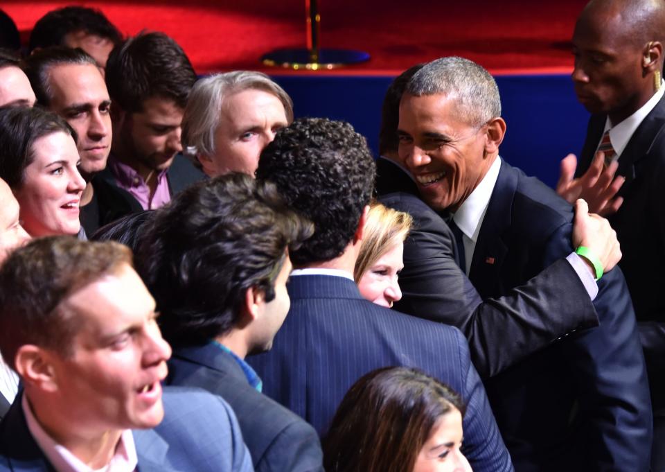 Obama hugs supporters after his farewell address.