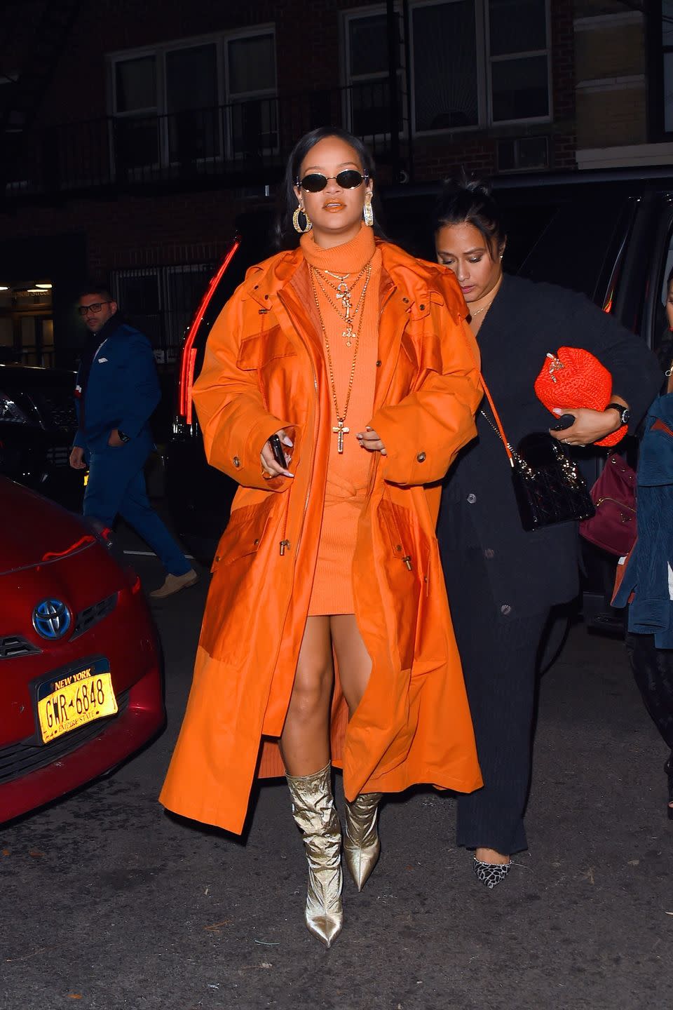 <p>In head-to-toe Fenty, including a trench-inspired <a href="https://www.fenty.com/us/en/products/coats-jackets-trench-inspired-parka-burnt-orange-m/102158.html" rel="nofollow noopener" target="_blank" data-ylk="slk:burnt orange parka;elm:context_link;itc:0;sec:content-canvas" class="link ">burnt orange parka</a>, a <a href="https://www.fenty.com/us/en/products/shirts-dresses-turtleneck-knit-mini-dress-burnt-orange-xs/102198.html" rel="nofollow noopener" target="_blank" data-ylk="slk:turtleneck knit mini dress;elm:context_link;itc:0;sec:content-canvas" class="link ">turtleneck knit mini dress</a>, <a href="https://www.fenty.com/us/en/products/shoes-parachute-boots-105-champagne-35/102091.html" rel="nofollow noopener" target="_blank" data-ylk="slk:parachute boots;elm:context_link;itc:0;sec:content-canvas" class="link ">parachute boots</a>, and <a href="https://www.fenty.com/us/en/products/sunglasses-side-note-sunglasses-camo-green-one-size/102118.html" rel="nofollow noopener" target="_blank" data-ylk="slk:side note shades;elm:context_link;itc:0;sec:content-canvas" class="link ">side note shades</a> at the Fenty pop-up shop in Bergdorfs. The singer accessorized her look with jewelry by <a href="https://www.modaoperandi.com/apres-ski-diamonds-ss20" rel="nofollow noopener" target="_blank" data-ylk="slk:Melissa Kaye;elm:context_link;itc:0;sec:content-canvas" class="link ">Melissa Kaye</a>, <a href="https://www.davidwebb.com/pages/djwe" rel="nofollow noopener" target="_blank" data-ylk="slk:David Webb;elm:context_link;itc:0;sec:content-canvas" class="link ">David Webb</a>, <a href="https://www.chromehearts.com/" rel="nofollow noopener" target="_blank" data-ylk="slk:Chrome Hearts;elm:context_link;itc:0;sec:content-canvas" class="link ">Chrome Hearts</a>, <a href="http://www.suegragg.com/" rel="nofollow noopener" target="_blank" data-ylk="slk:Sue Gragg;elm:context_link;itc:0;sec:content-canvas" class="link ">Sue Gragg</a>, and <a href="https://www.rafaelloandcompany.com/" rel="nofollow noopener" target="_blank" data-ylk="slk:Rafaello and Co;elm:context_link;itc:0;sec:content-canvas" class="link ">Rafaello and Co</a>.</p>